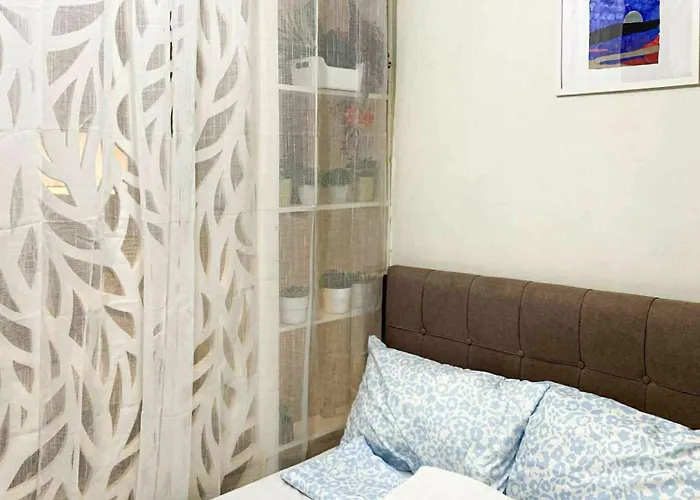 Warm Retreat With Balcony At Shore 2 Residences Apartment